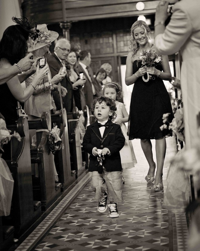 Page boy walking up the aisle. Children at weddings. Real wedding by Tara Aherne Photography page boy wedding suit ireland